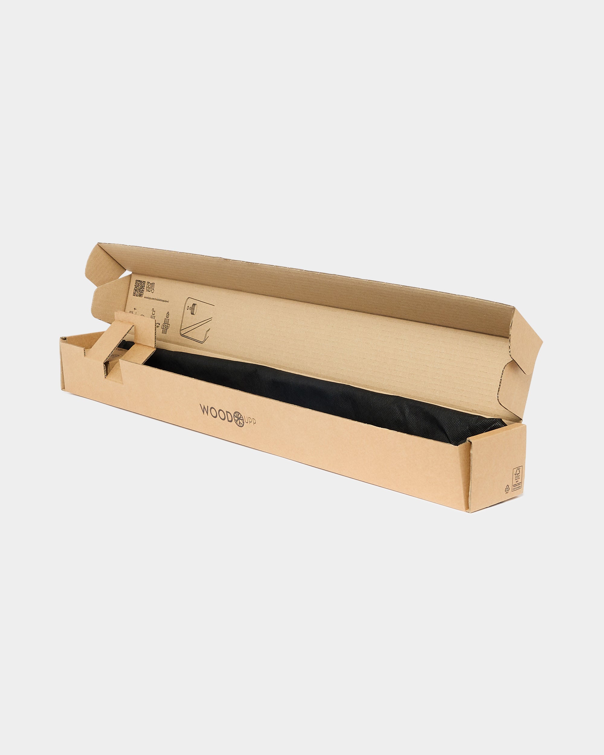 An open cardboard box with a black acoustic panel partially visible inside, placed on a plain white background, suitable for packaging or shipping displays.